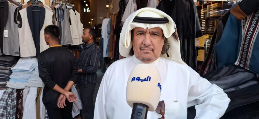 صور|-الشتاء-ينعش-سوق-القيصرية-بالمشالح-الشتوية-والفرو-والسديريات